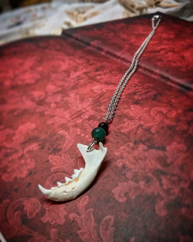 Jaw bone necklace with green aventurine and black jasper (mink mandible)