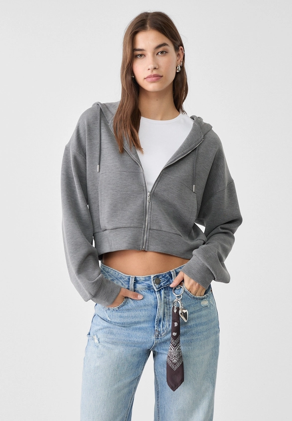 Veste à capuche au toucher doux - Sweats femme | Stradivarius France