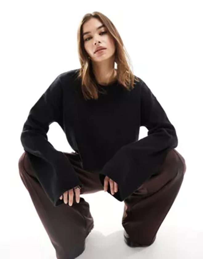 Monki cropped long sleeve knitted top in black | ASOS