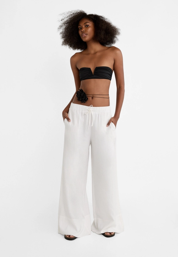 Pantalon wide leg à taille élastique avec lin - Tout afficher femme | Stradivarius France