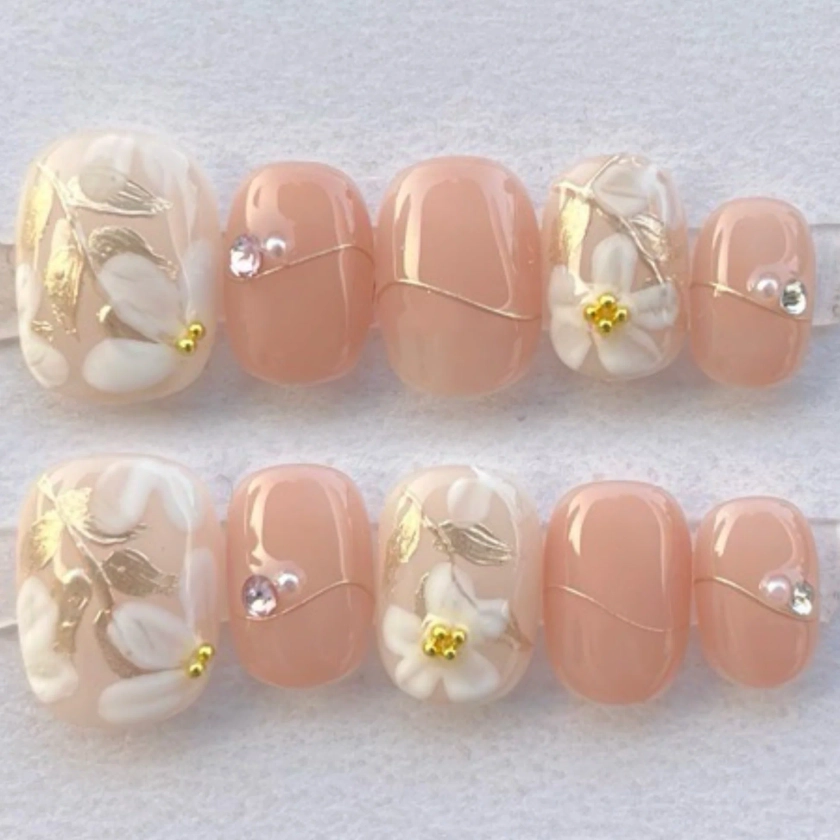Elegant Press-On Nails with Gold Foil Design and Rhinestones