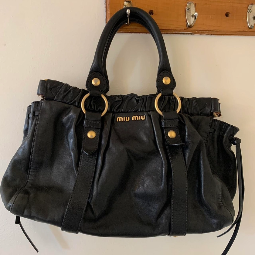 Miu Miu black leather bag with gold hardware - Depop