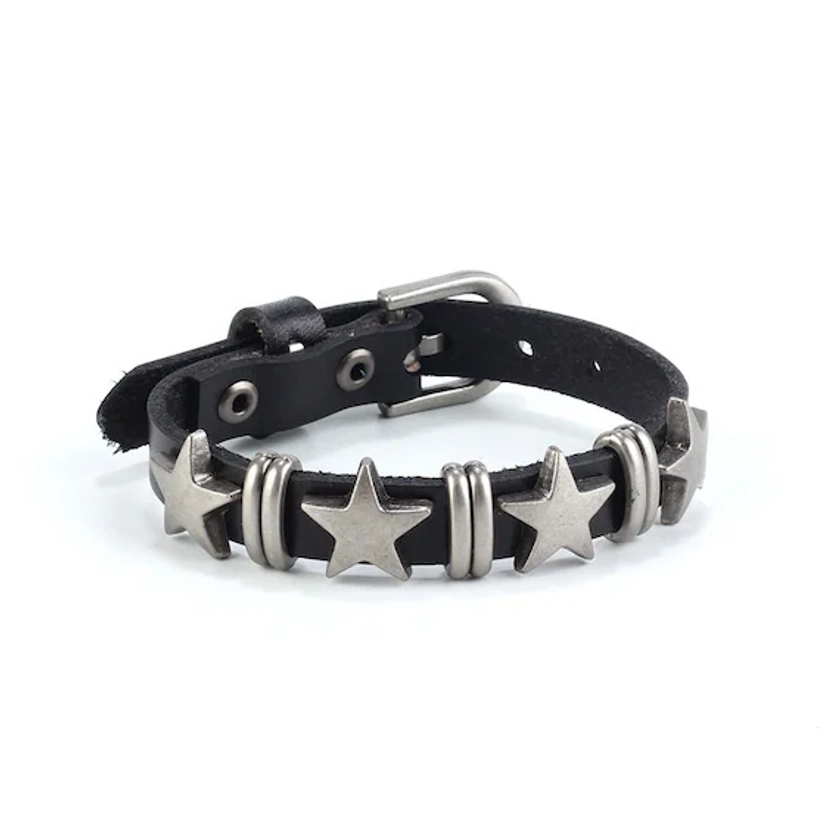 Bracelet en cuir noir avec étoile argentée, quincaillerie en métal liée