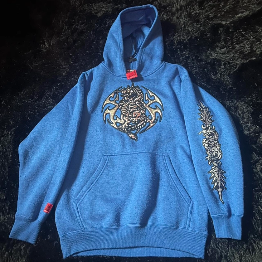 Rare Blue JNCO HOODIE with silver graphics in middle... - Depop