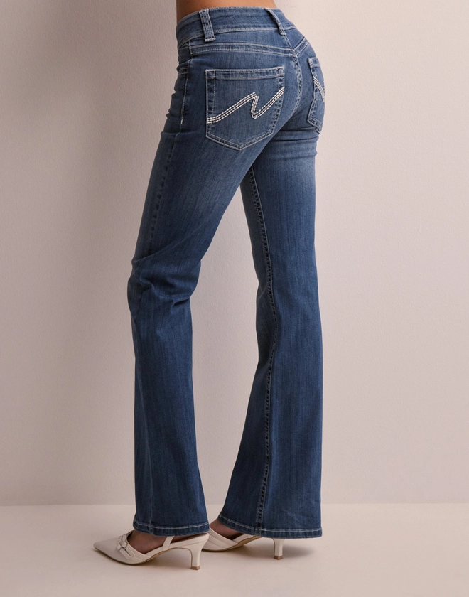 Köp Nelly Low Waist Bootcut Stitch Jeans - Dark Blue | Nelly.com