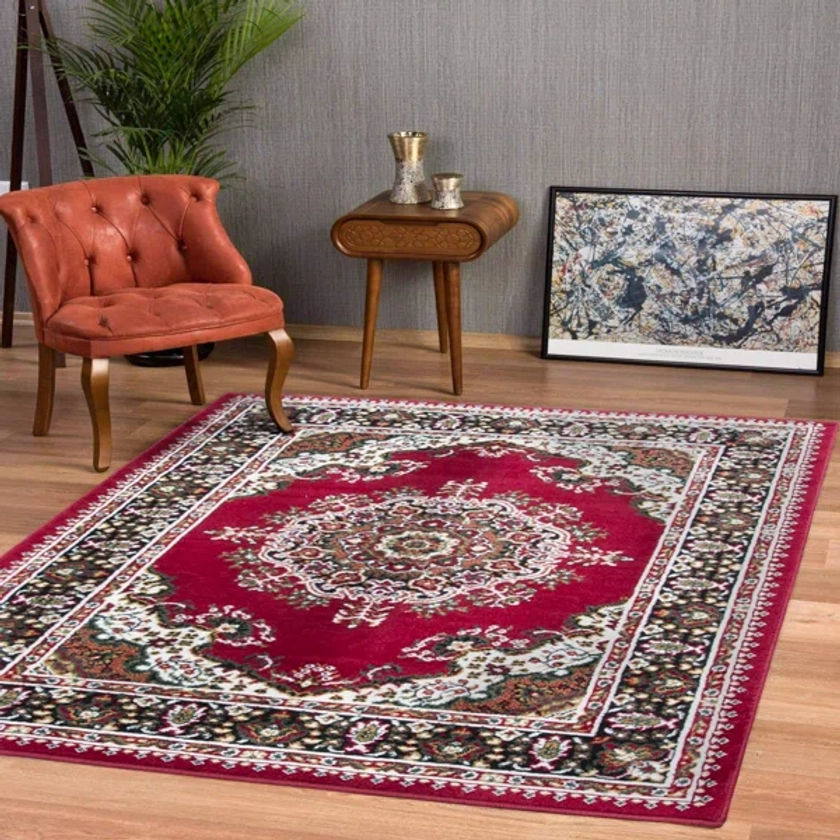 Kevon Oriental Machine Woven Red Area Rug