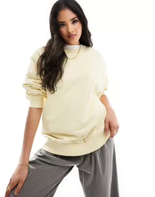 ASOS DESIGN oversized sweatshirt in washed lemon