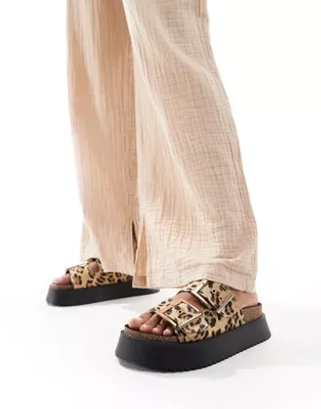 ASOS DESIGN Firecracker double strap footbed flat sandals in leopard | ASOS