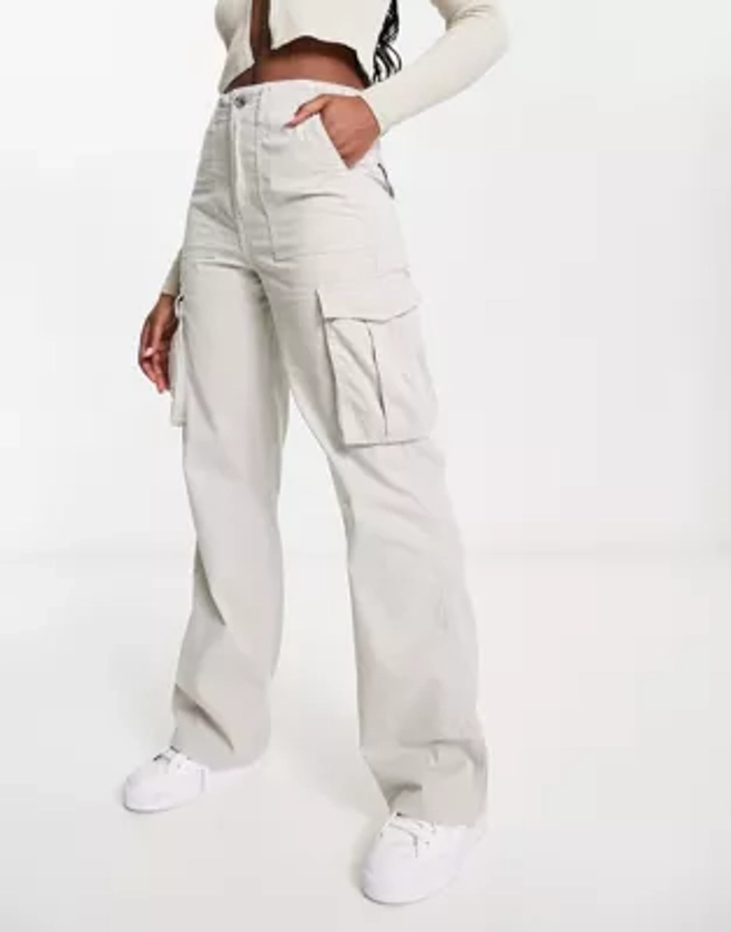 Bershka straight leg cargo trousers in stone