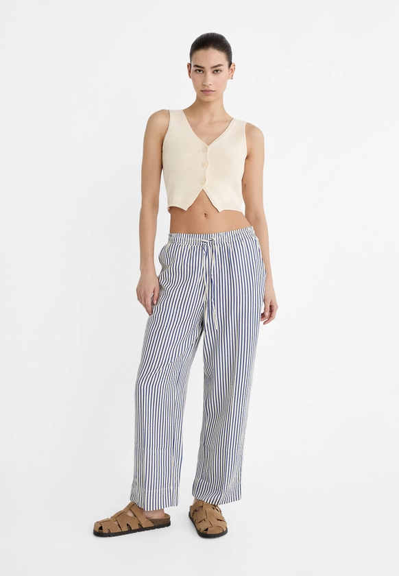 Flowing carrot fit trousers - Women's fashion | Stradivarius United States