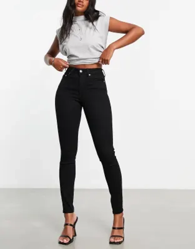 ASOS DESIGN skinny jeans in clean black