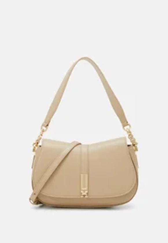 Tommy Hilfiger HERITAGE SADDLE BAG - Sac à main - beige - ZALANDO.FR