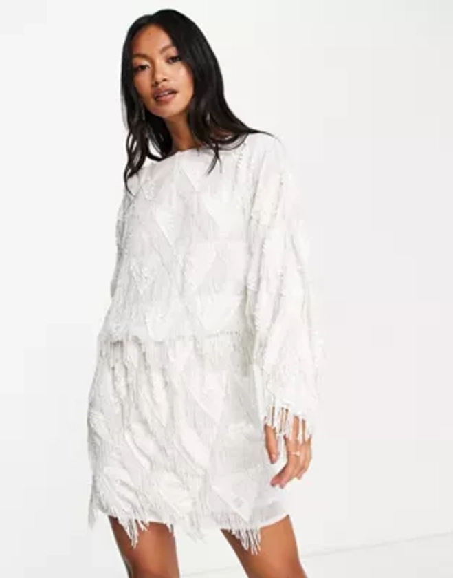 ASOS DESIGN - Robe courte à manches chauve-souris et franges ornementées - Blanc | ASOS