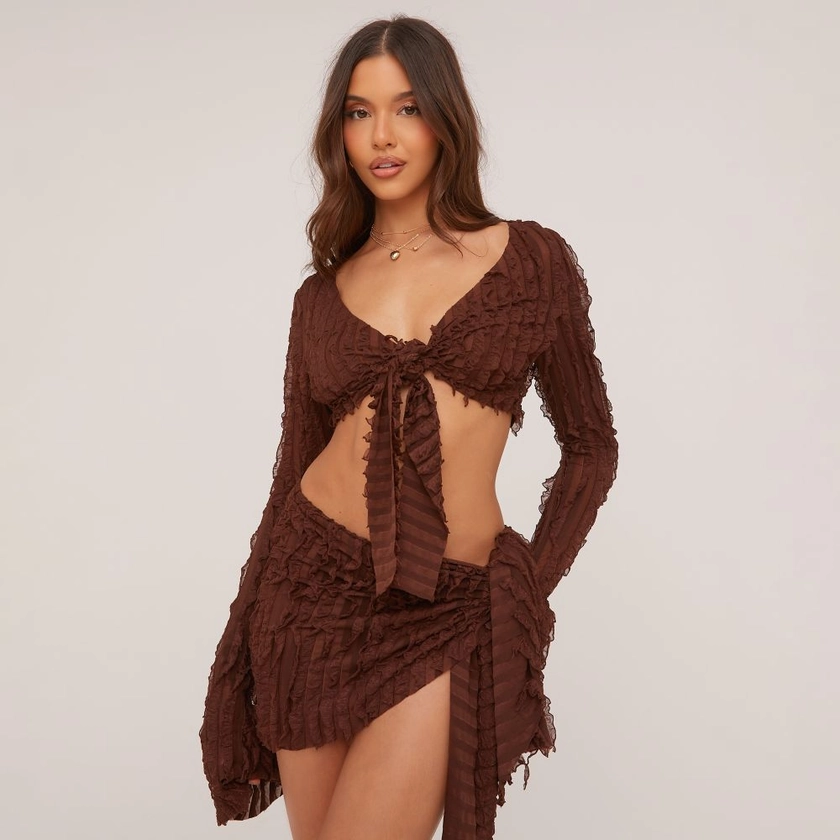Long Sleeve Tie Front Detail Plunge Crop Top And Tie Side Mini Skirt Co-Ord Set In Brown Shirred