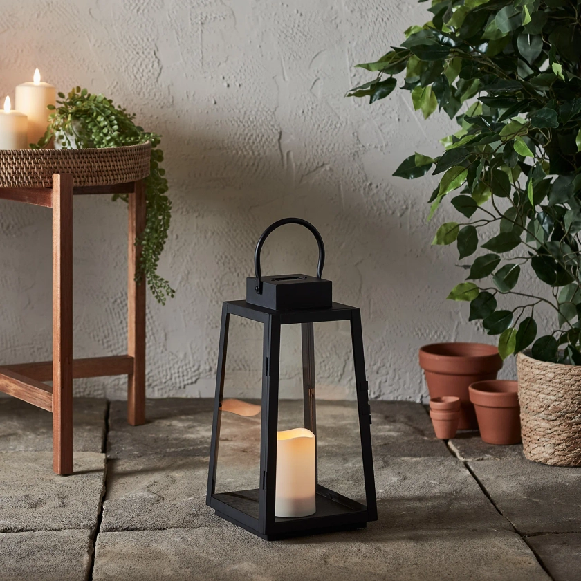 Eliza Trapeze Black Solar Lantern with White Candle