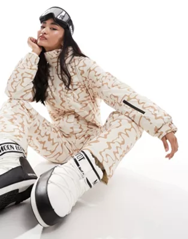 Urban Threads Ski suit in beige with abstract print | ASOS