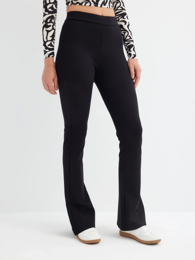 Legging flare crepe negro