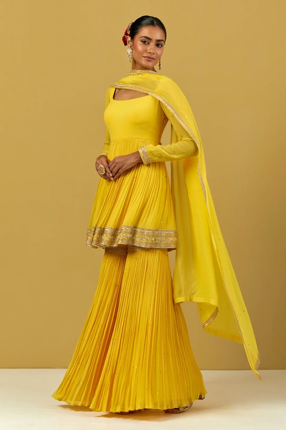 Buy Yellow Georgette Hand Embroidered Gharara For Women by Ikshita Choudhary Online at Aza Fashions.