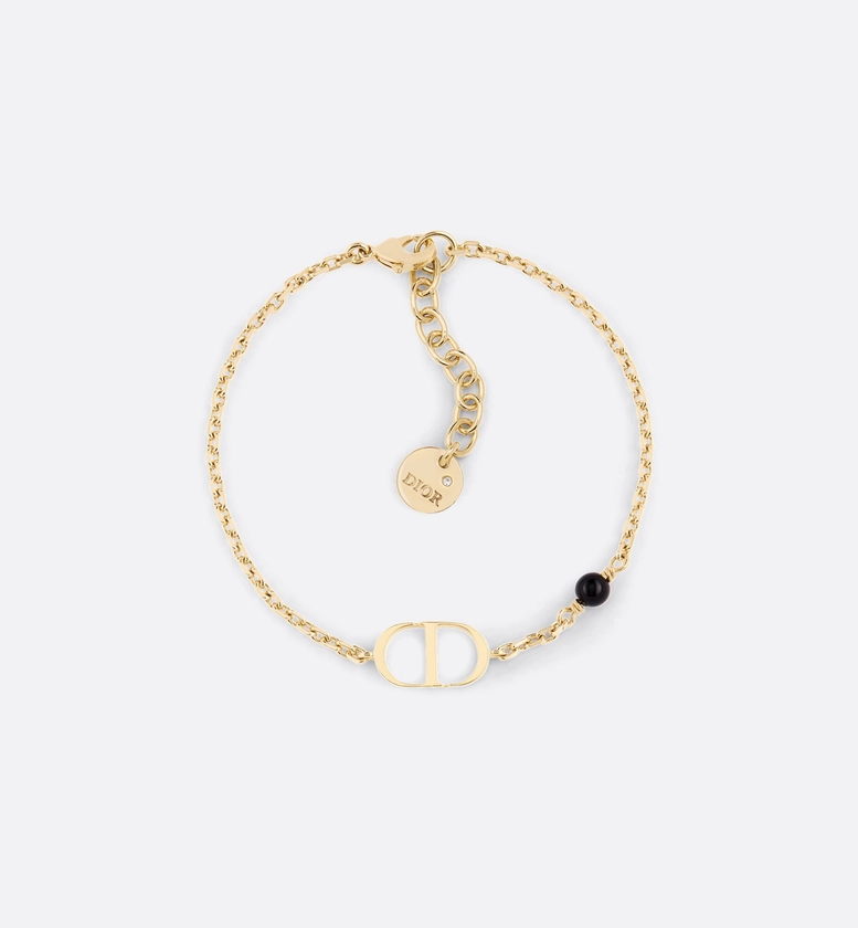 Bracelet Petit CD Métal finition dorée et perle en résine noire | DIOR