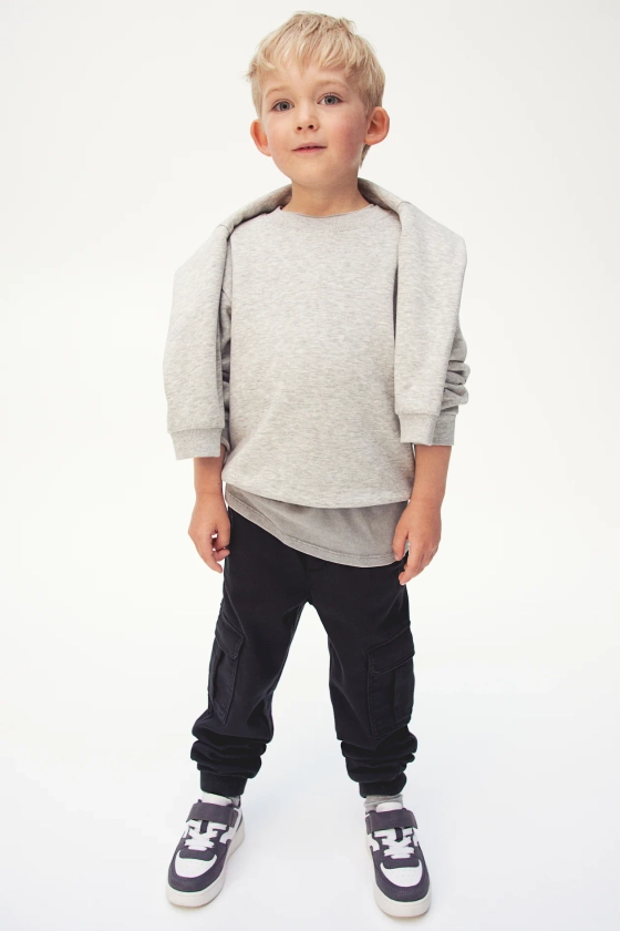 Joggers modello cargo - Vita normale - Lungo - Nero - BAMBINO | H&M IT