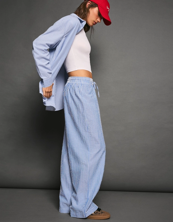 Striped wide-leg creased-effect trousers