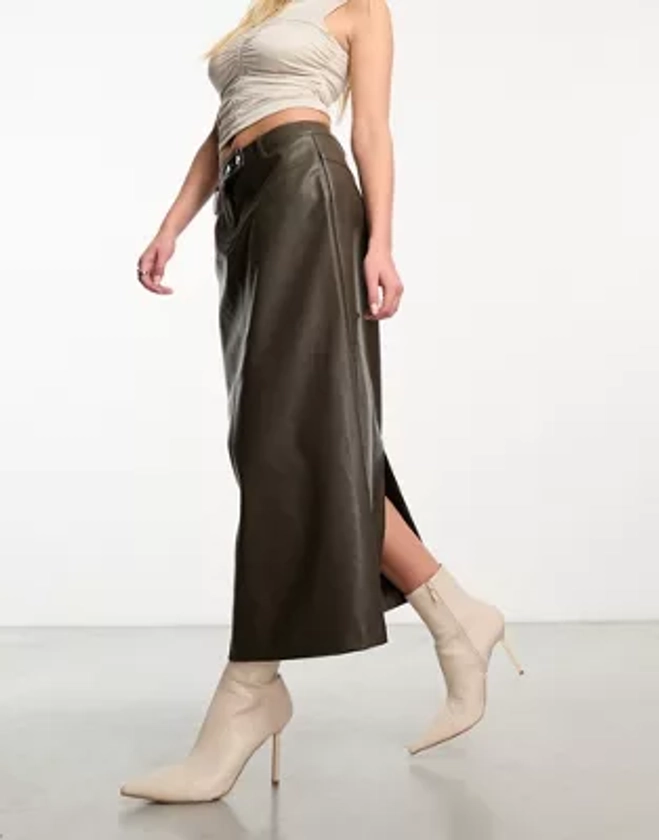 NA-KD faux leather midi skirt in dark olive | ASOS
