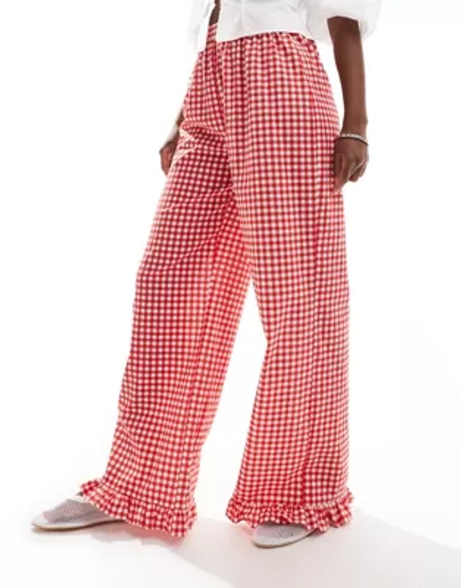 ASOS DESIGN gingham trousers with frill hem in red