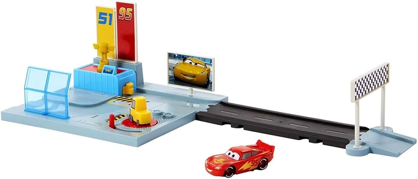 Disney and Pixar Cars On The Road Dinoco Rusteze Racing Center Playset with Lightning McQueen Toy Car, Launcher, Short Track and Spinning Pitty, Toy Gift for Kids, HGV69