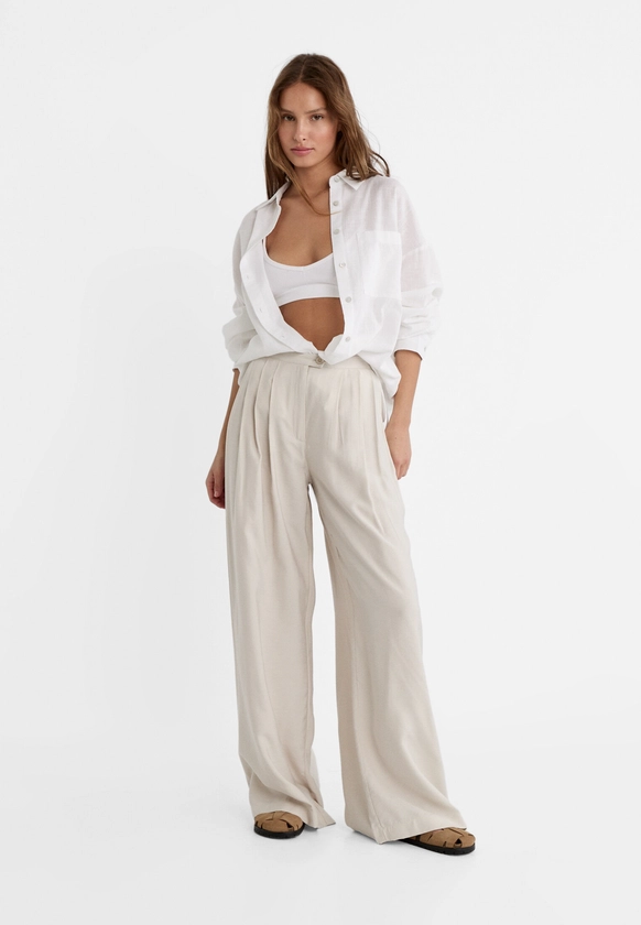 Pantalon palazzo fluide texturé - Mode femme | Stradivarius France