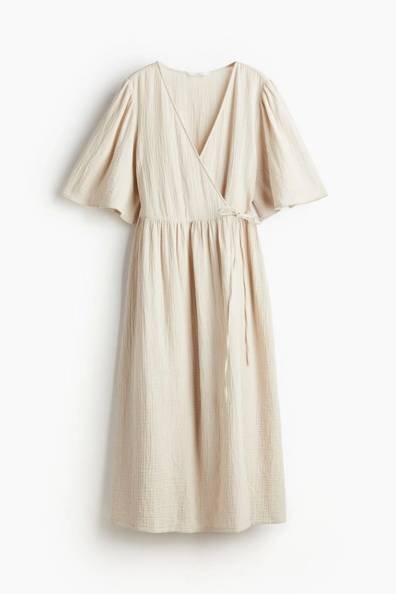 Muslin wrap dress - V-neck - Short sleeve - Light beige - Ladies | H&M GB