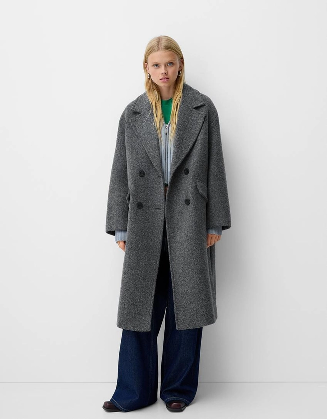 Manteau long épaules tombantes