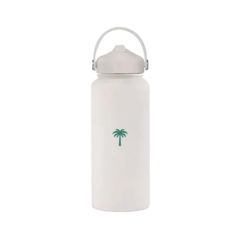 The off white bottle with straw lid