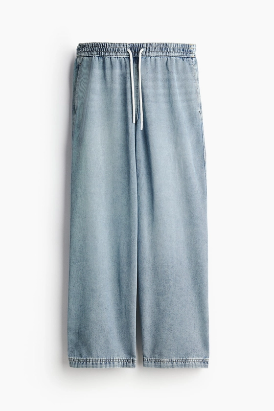 Pantalon en denim avec taille élastique - Taille régulière - Longue - Bleu denim clair - FEMME | H&M BE