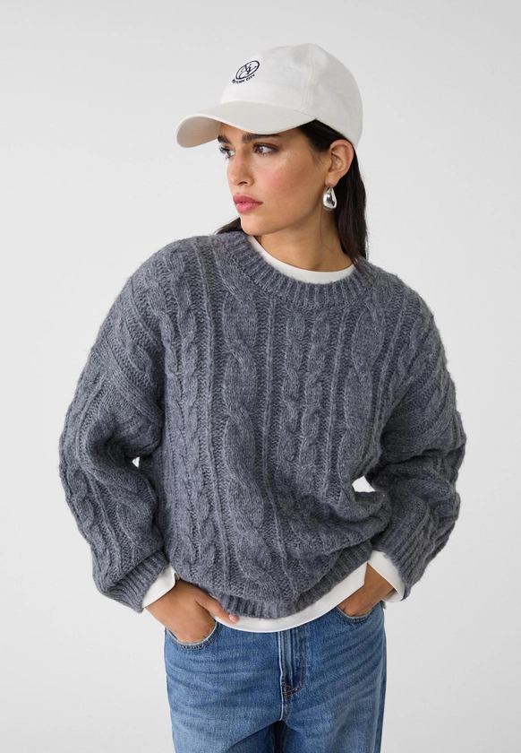 Pull en maille tressée