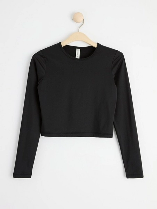 Cropped long sleeve sports top | Lindex UK