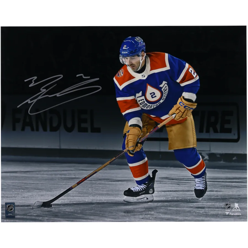Evan Bouchard Edmonton Oilers Autographed 16" x 20" 2023 Heritage Classic with Puck Photograph