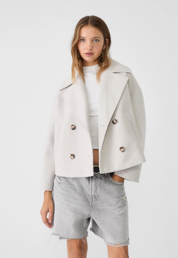 Short double-breasted coat - Women's fashion | Stradivarius United Kingdom