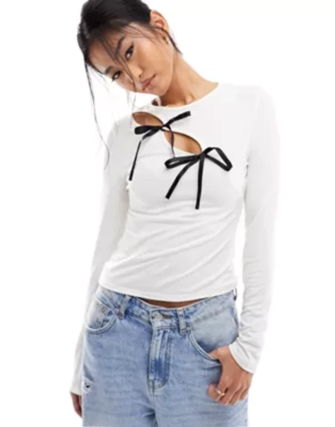 ASOS DESIGN cut out long sleeve top with bow detail in ivory | ASOS