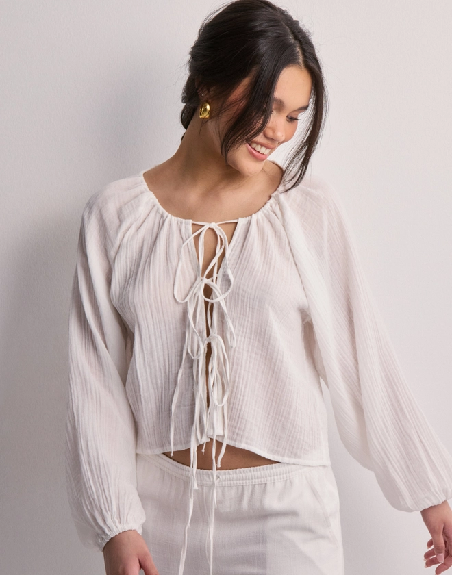 Köp Nelly Volume Tied Blouse - White | Nelly.com