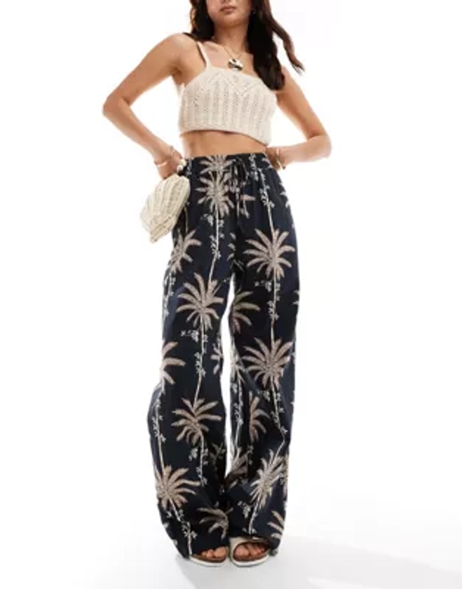 ASOS DESIGN - Pantalon large en lin mélangé avec lien à la taille - Imprimé palmier
