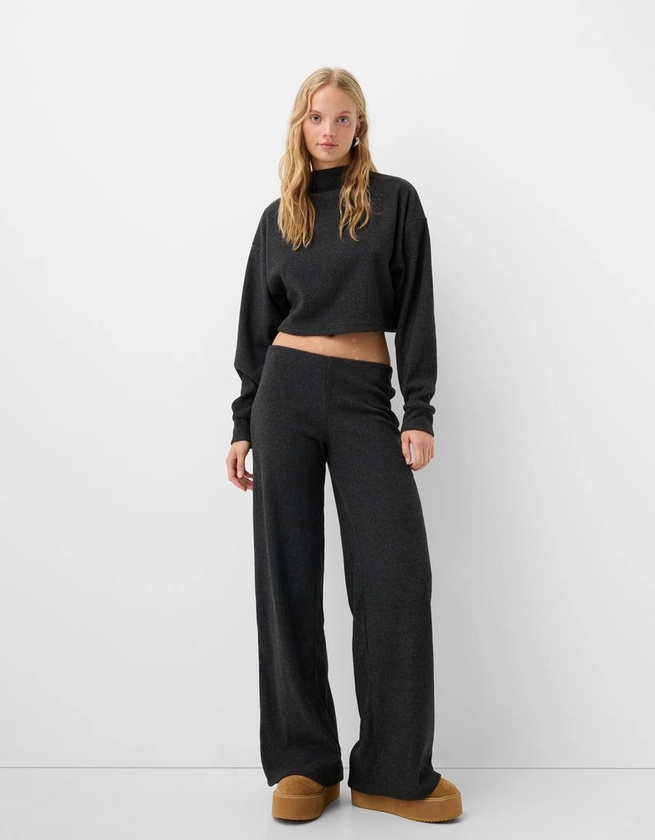 Wide-leg ribbed soft touch trousers - Women