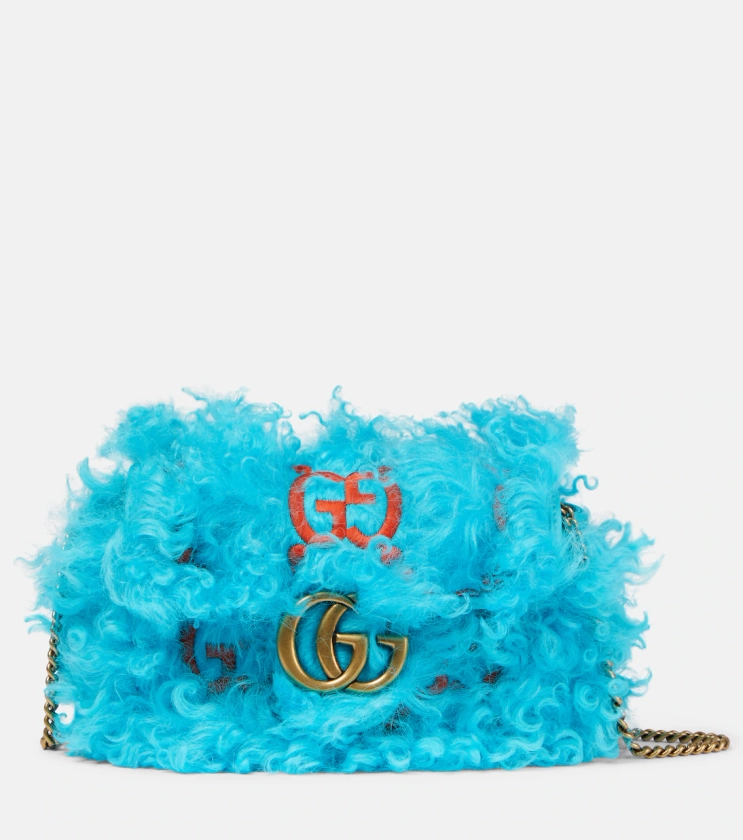 GG Marmont shearling shoulder bag in blue - Gucci | Mytheresa