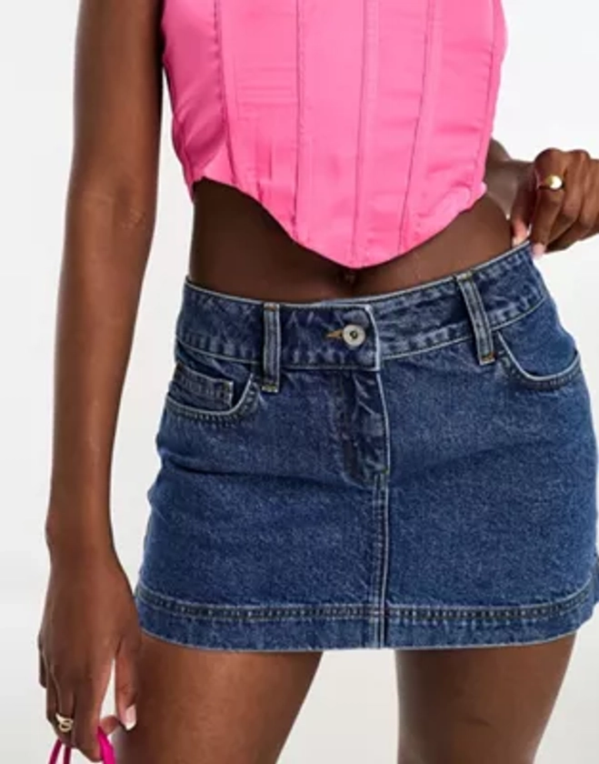 ASOS Weekend Collective low rise denim mini skirt in mid wash | ASOS