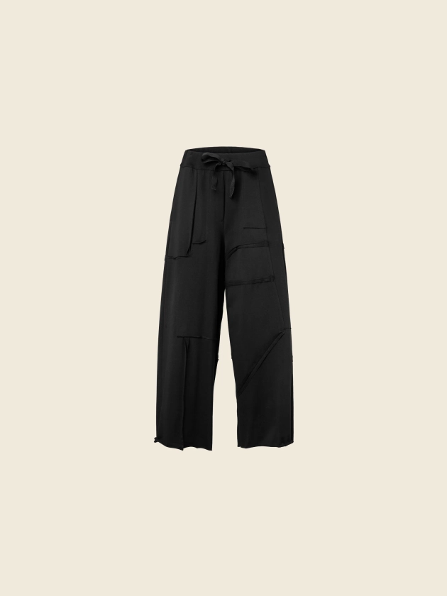 PALAZZO SWEATPANTS WITH RAW CUT SEAMS