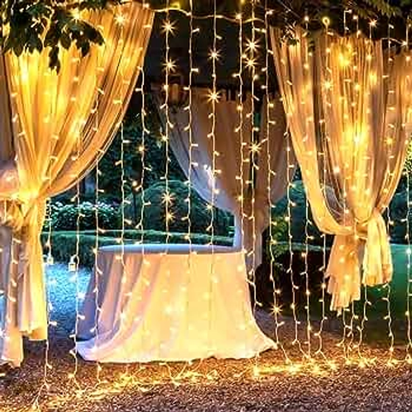 Brightown 300 LED Curtain String Lights, 9.8 FT Hanging Fairy Lights with Remote, 8 Modes, Connectable Waterproof Window Lights for Bedroom Backdrop Wedding Outdoor Christmas Party, Warm White