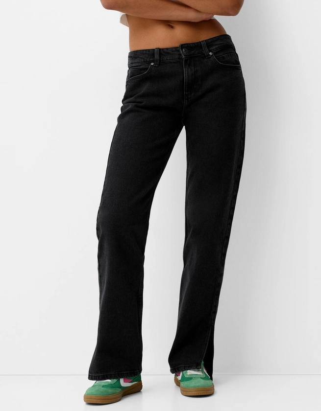 Jeans flare abertura lateral