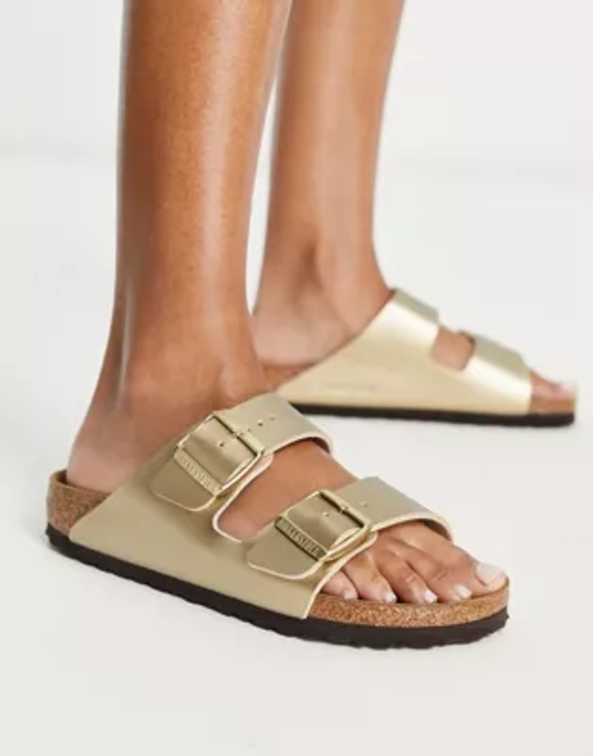 Birkenstock Arizona birko-flor flat sandals in gold | ASOS
