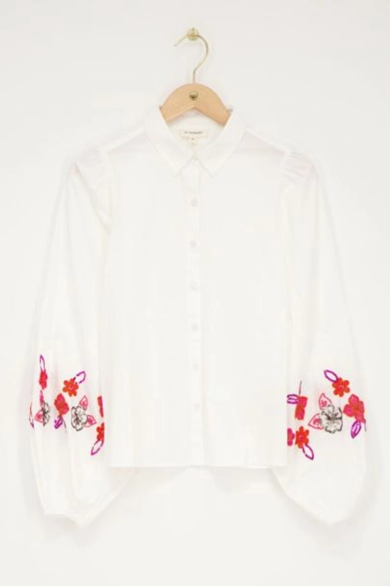 Witte blouse met roze kralen bloemen