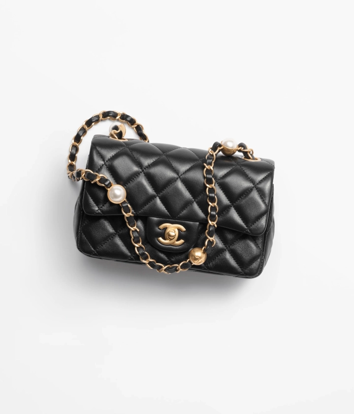 Mini flap bag, Shiny lambskin, imitation pearls & gold-tone metal, black — Fashion | CHANEL