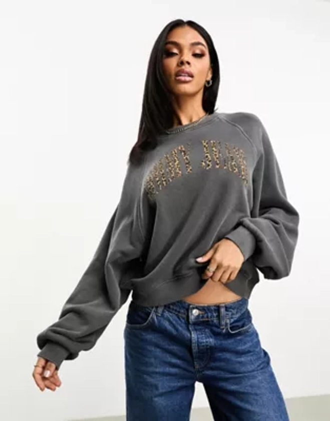 Tommy Jeans relaxed leopard print logo crewneck sweatshirt in charcoal | ASOS